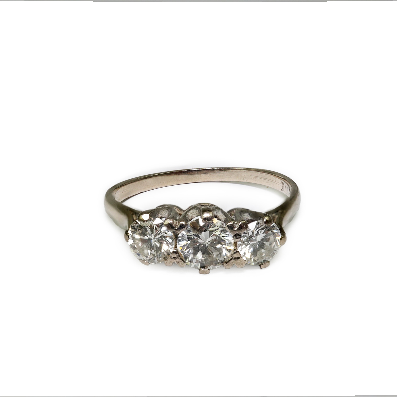 An 18ct white gold and three stone diamond set ring